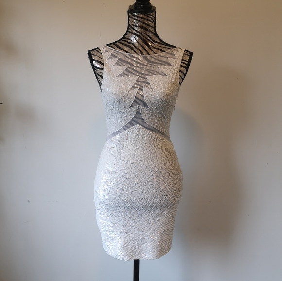 bebe Dresses & Skirts - BEBE "Ice Queen" mini sequin/mesh accent dress